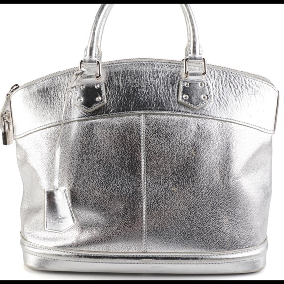 Louis Vuitton Lockit Bag in Silver Metallic Suhali Leather. - Picture 1 of 7